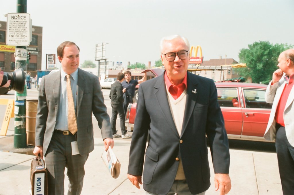 Harry Caray greeting fans and players at Wrigley Field - Chicago Sun-Times