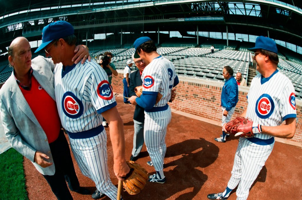 Harry Caray greeting fans and players at Wrigley Field - Chicago Sun-Times
