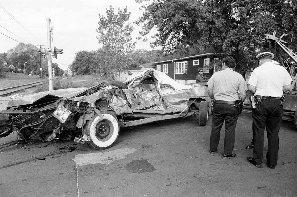 A passenger train and car collide - Chicago Sun-Times