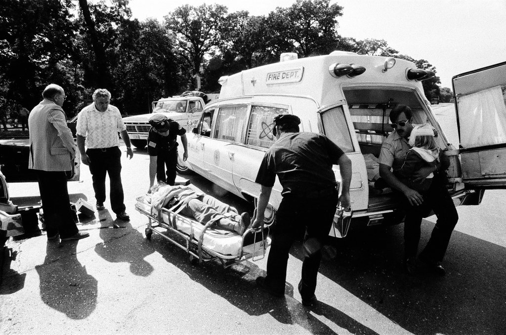 Car accident passengers are placed in ambulances - Chicago Sun-Times
