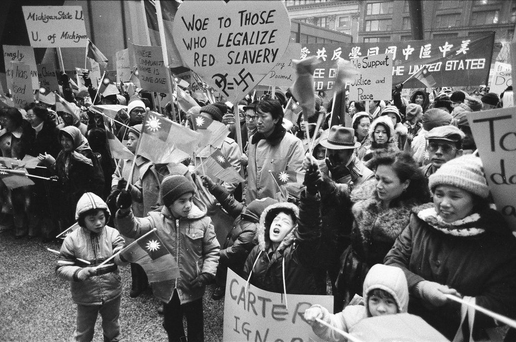 Members of Chicago's Chinese community rally at the Federal Building - Chicago Sun-Times