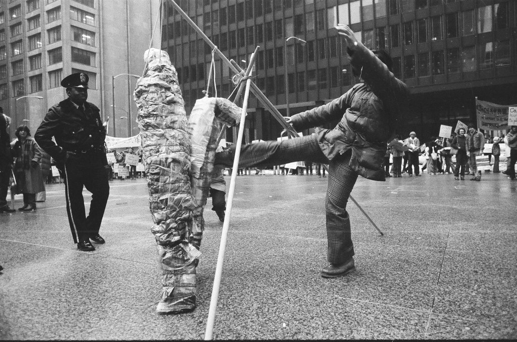 Members of Chicago's Chinese community rally at the Federal Building - Chicago Sun-Times