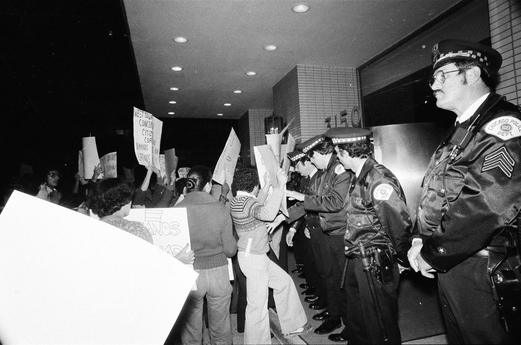 Over one hundred members of Chicago's Latinx community protest Postmaster's apartment - Chicago Sun-Times