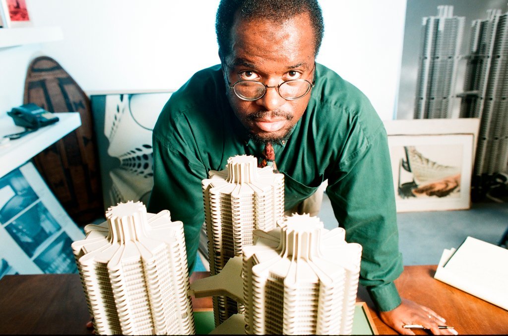 Sun-Times writer Lee Bey with model of Marina City - Rich Hein for Chicago Sun-Times