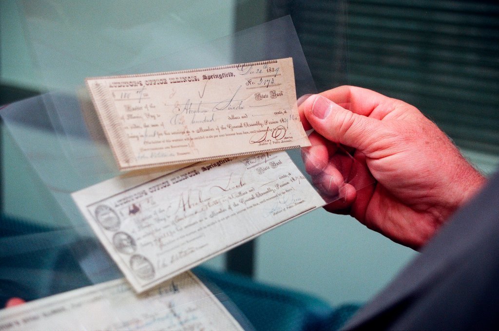 George Ryan holds Lincoln check - Chicago Sun-Times
