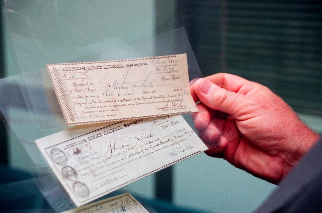 George Ryan holds Lincoln check - Chicago Sun-Times