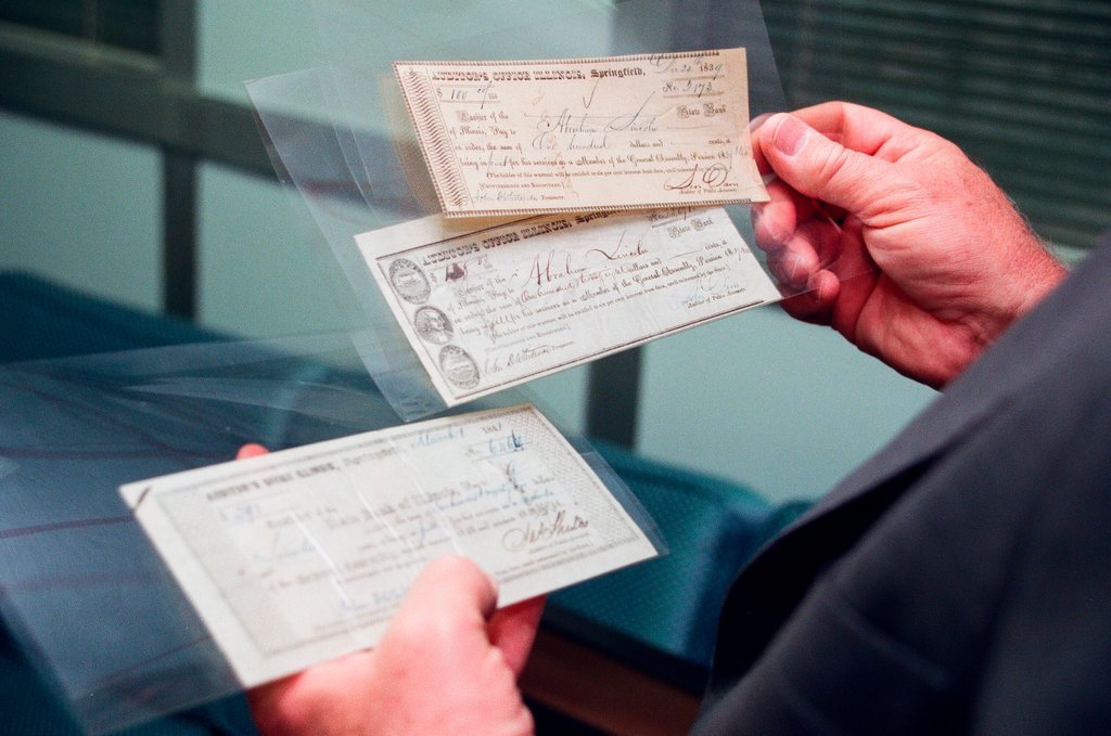 George Ryan holds Lincoln check - Chicago Sun-Times