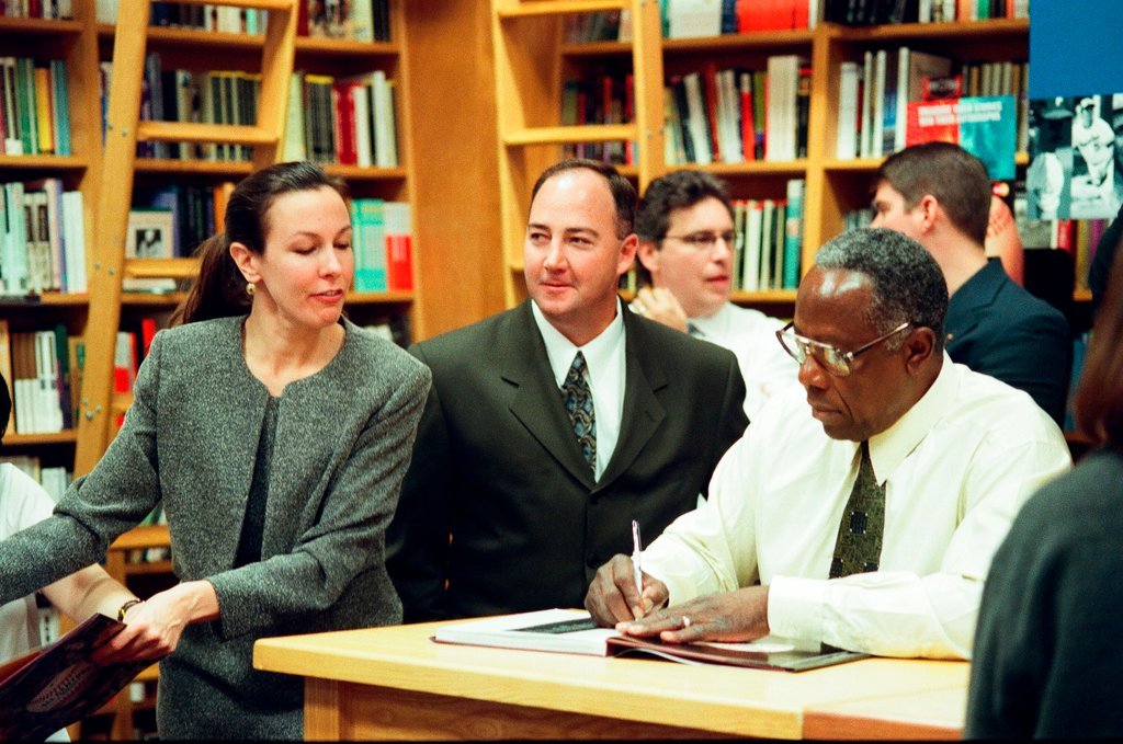 Hank Aaron and Willie Mays sign books - John H. White for Chicago Sun-Times