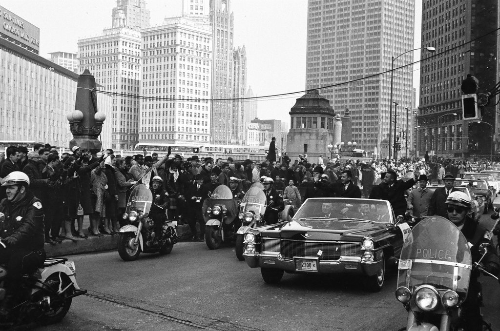 Astronauts Grissom and Young ride in car en route to parade - Bud Daley for Chicago Sun-Times