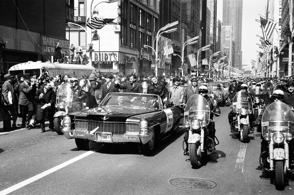Astronauts Grissom and Young ride in car en route to parade - Bud Daley for Chicago Sun-Times