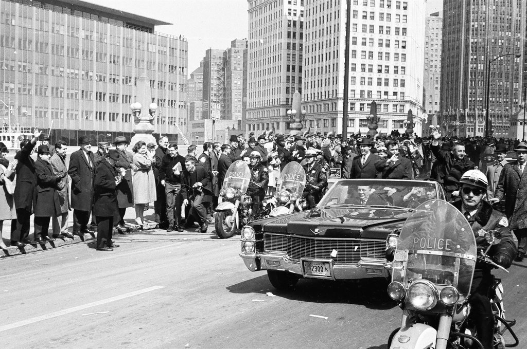 Astronauts Grissom and Young ride in car en route to parade - Bud Daley for Chicago Sun-Times