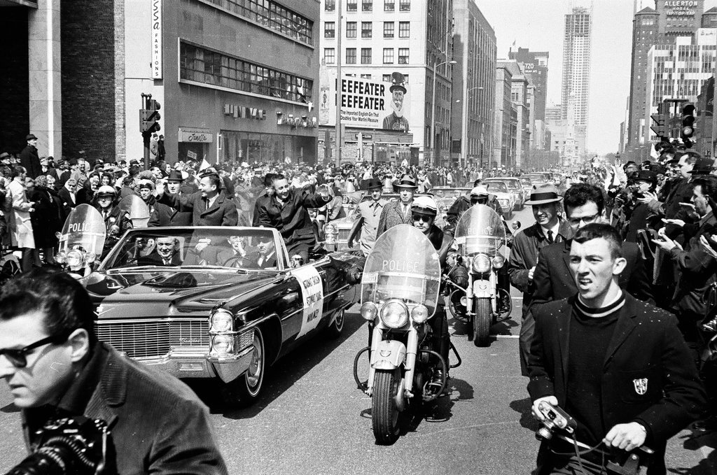 Astronauts Grissom and Young ride in car en route to parade - Bud Daley for Chicago Sun-Times