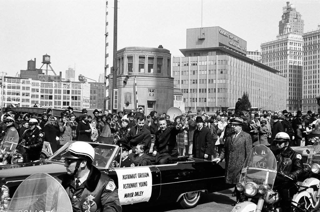 Astronauts Grissom and Young ride in car en route to parade - Bud Daley for Chicago Sun-Times