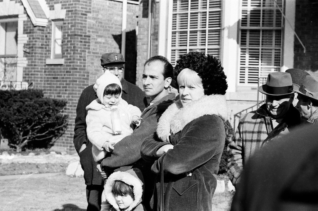 Parents and children stand outside Lyon School - Chicago Sun-Times