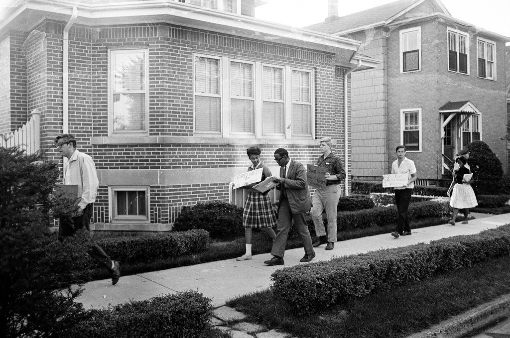 Marchers outside Mayor Daley's house regarding lack of action on integration - Luther Joseph for Chicago Sun-Times
