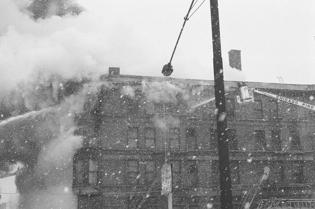Firefighters working in the snow - Chicago Sun-Times