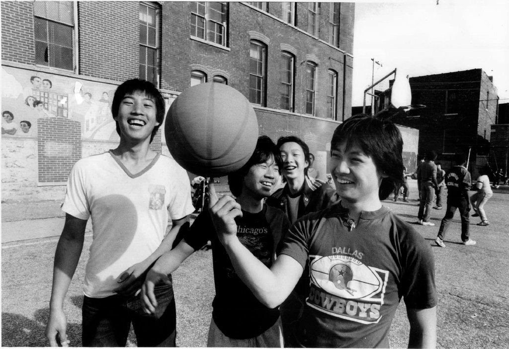 Teens playing basketball - John H. White for Chicago Sun-Times
