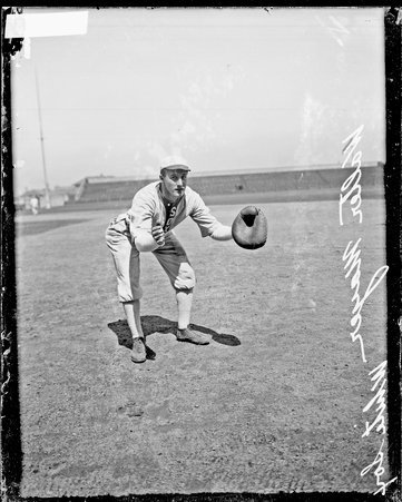 Baseball player Walter Wally Mayer, White Sox, leaning forward and holding his hands out in front of him at Comiskey Park - Chicago Daily News, Inc.
