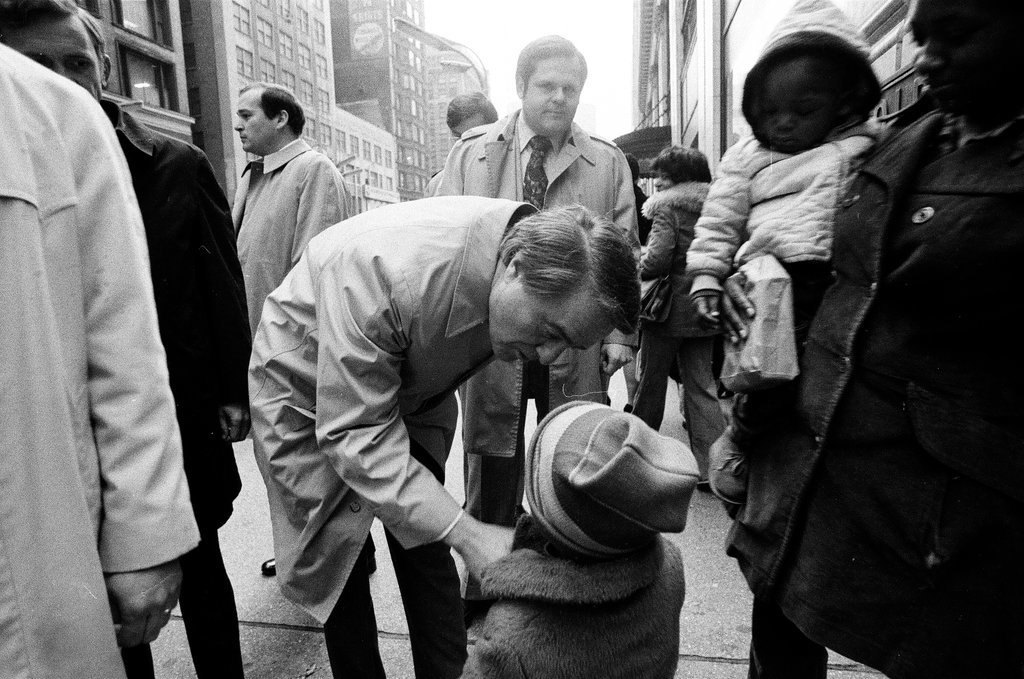 Sargent R. Shriver greets people on the street - Howard D. Simmons for Chicago Sun-Times