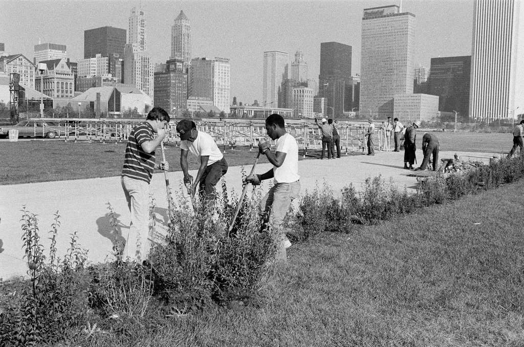 Volunteers work on altar in Grant Park - John H. White for Chicago Sun-Times