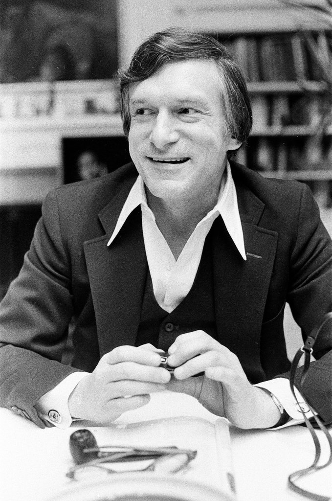 Hugh Hefner sits at desk - Chicago Sun-Times