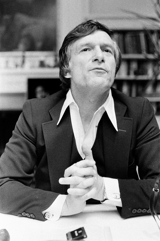 Hugh Hefner sits at desk - Chicago Sun-Times
