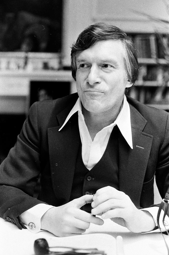 Hugh Hefner sits at desk - Chicago Sun-Times