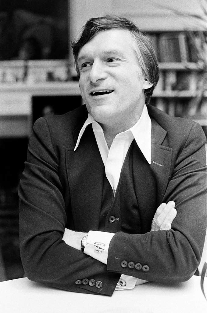 Hugh Hefner sits at desk - Chicago Sun-Times