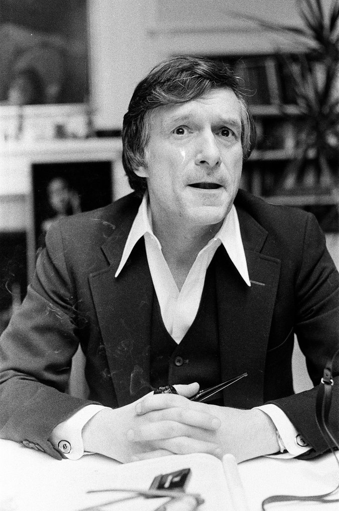 Hugh Hefner sits at desk - Chicago Sun-Times