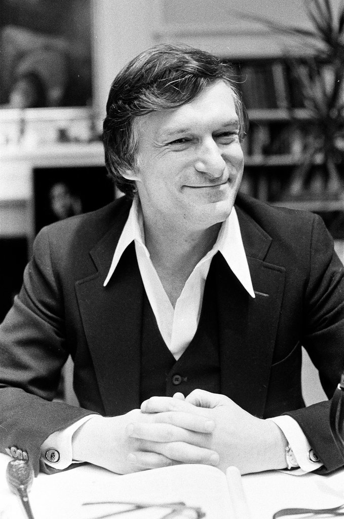 Hugh Hefner sits at desk - Chicago Sun-Times