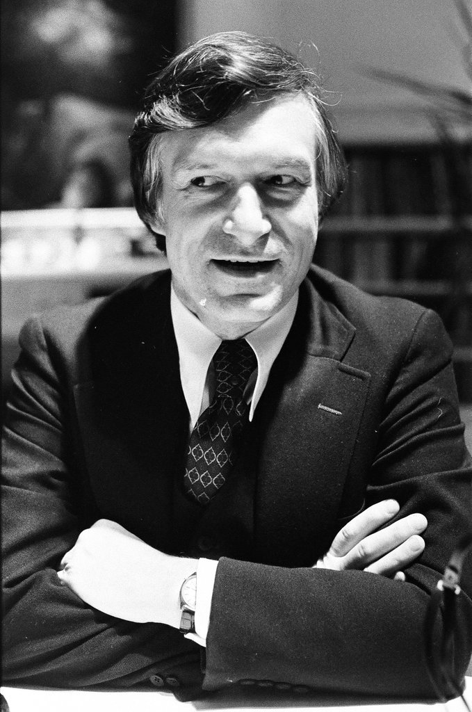 Hugh Hefner sits at desk - Chicago Sun-Times