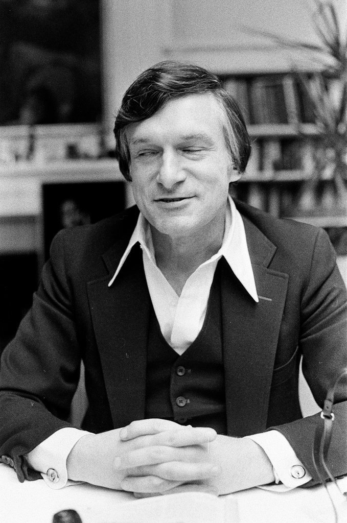 Hugh Hefner sits at desk - Chicago Sun-Times