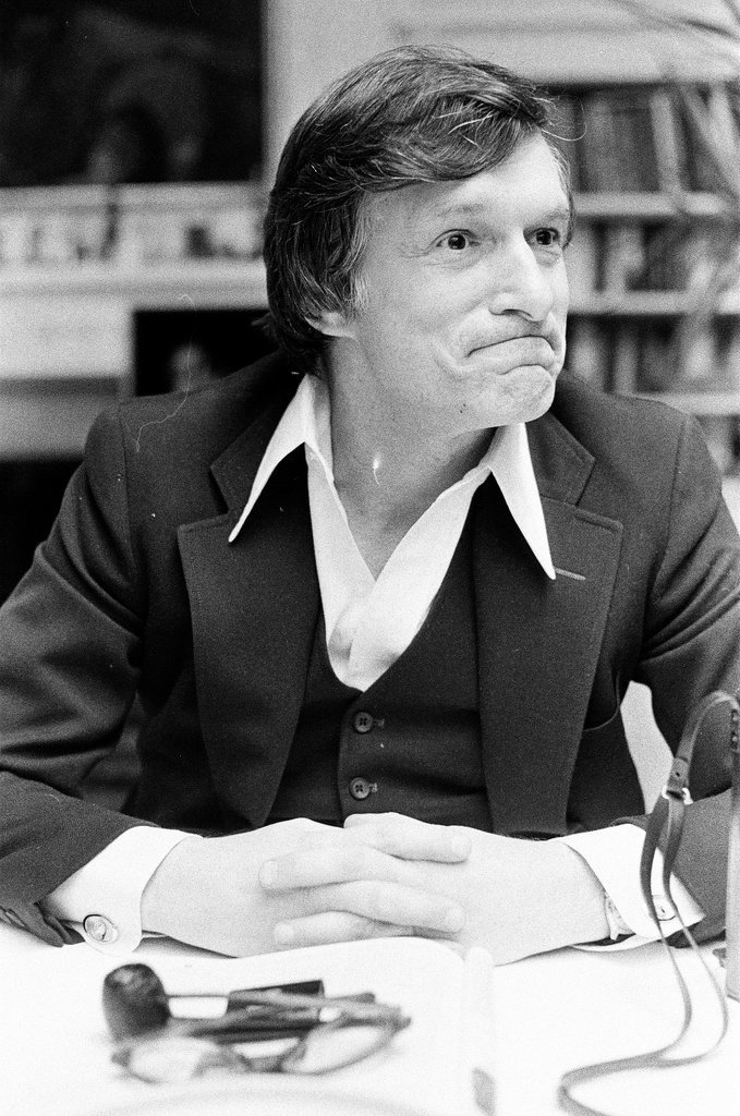 Hugh Hefner sits at desk - Chicago Sun-Times
