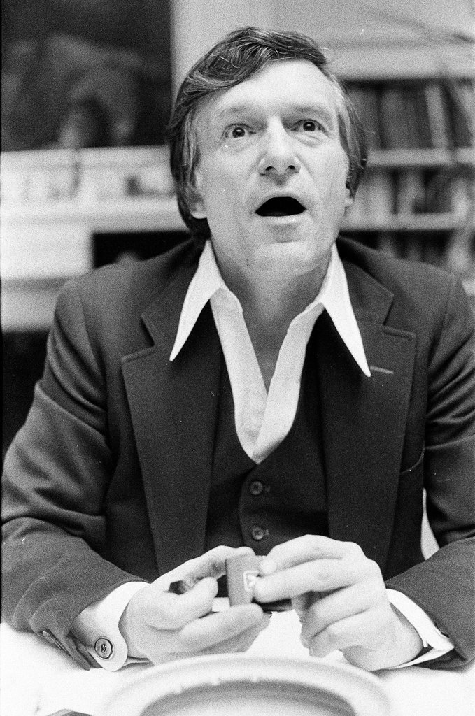 Hugh Hefner sits at desk - Chicago Sun-Times