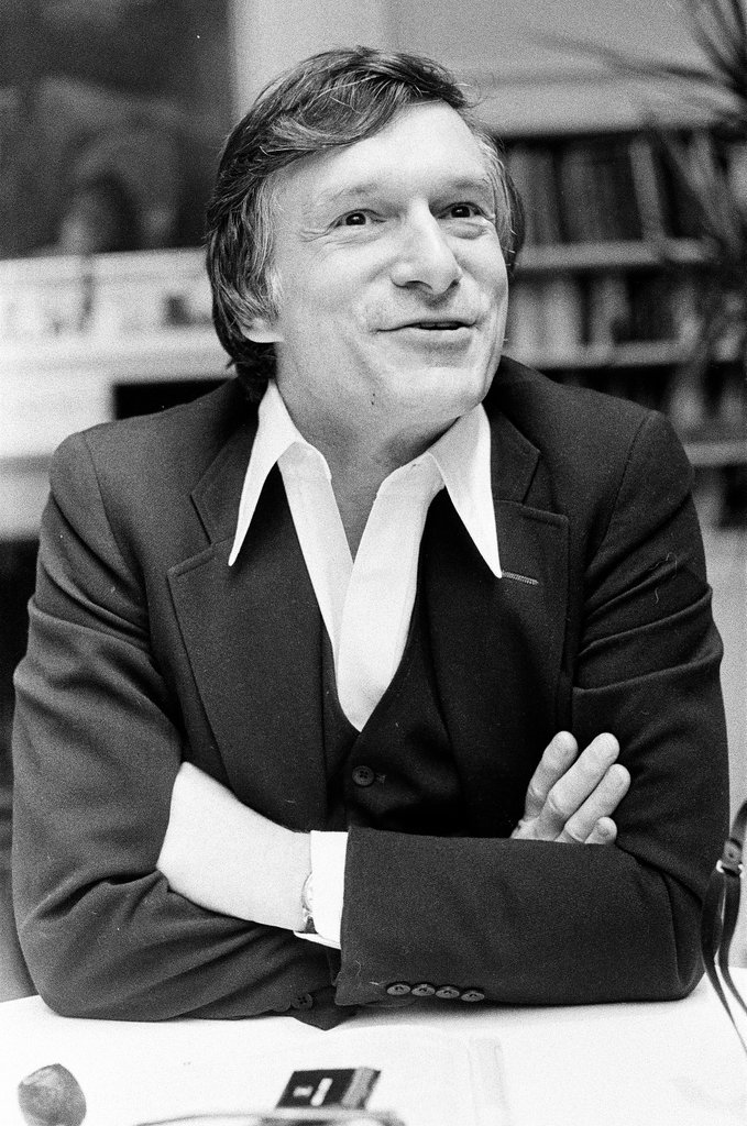 Hugh Hefner sits at desk - Chicago Sun-Times