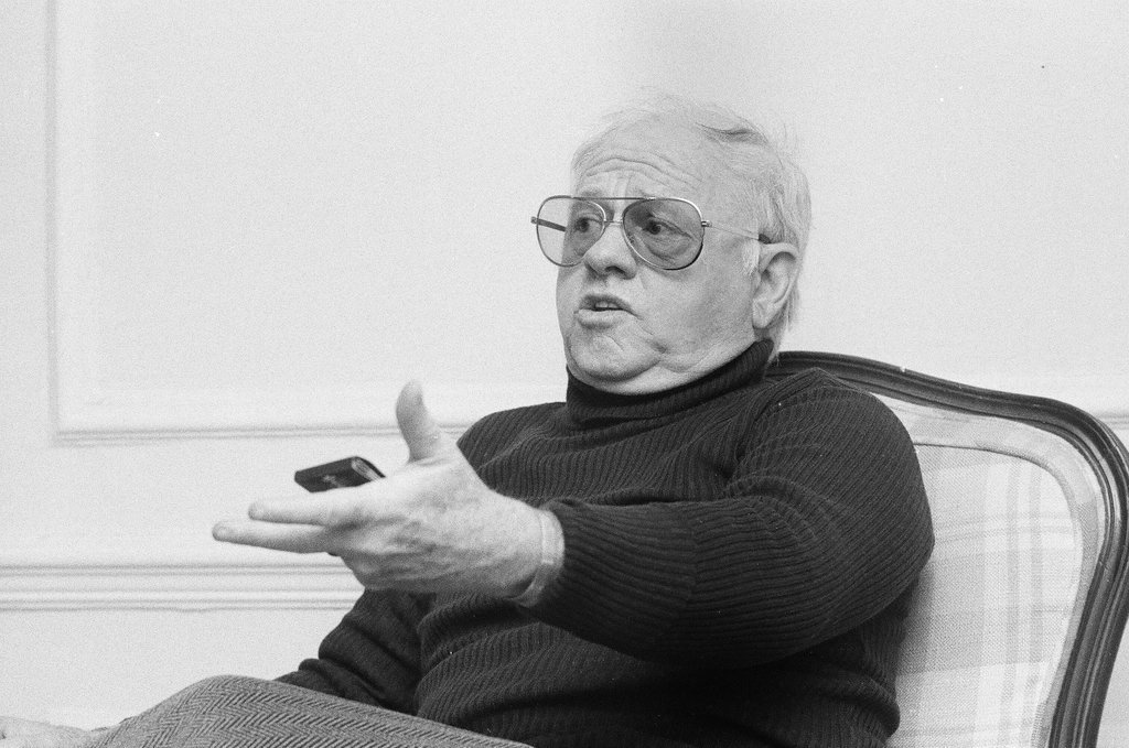 Mickey Rooney sitting in a chair - Jerry Tomaselli for Chicago Sun-Times