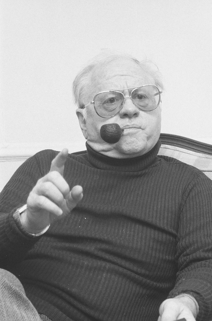 Mickey Rooney sitting in a chair - Jerry Tomaselli for Chicago Sun-Times