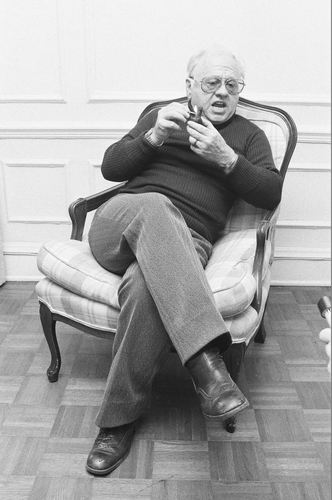 Mickey Rooney sitting in a chair - Jerry Tomaselli for Chicago Sun-Times