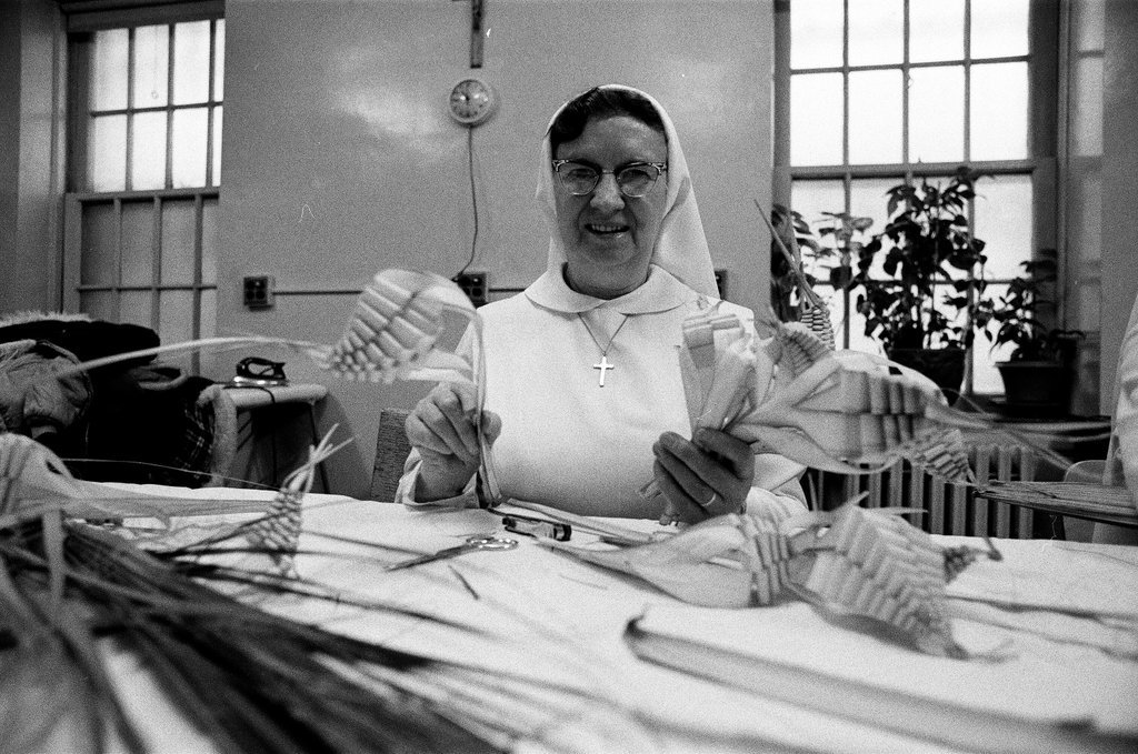 Nuns braiding palms - Chicago Sun-Times