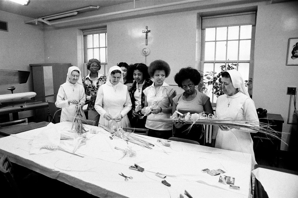 Nuns braiding palms - Chicago Sun-Times