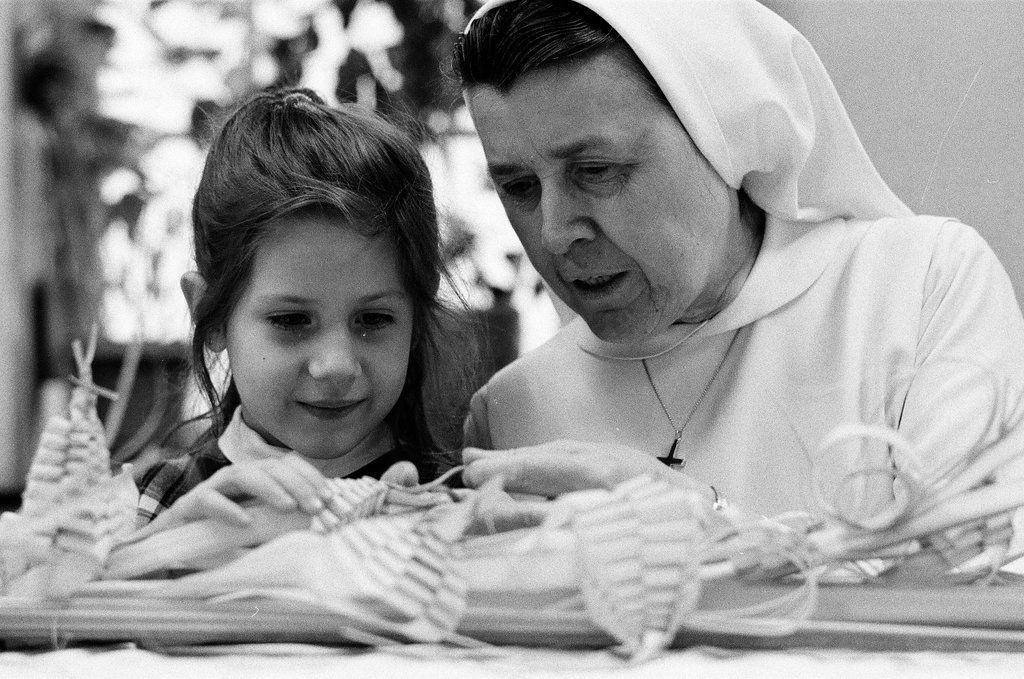 Nuns braiding palms - Chicago Sun-Times