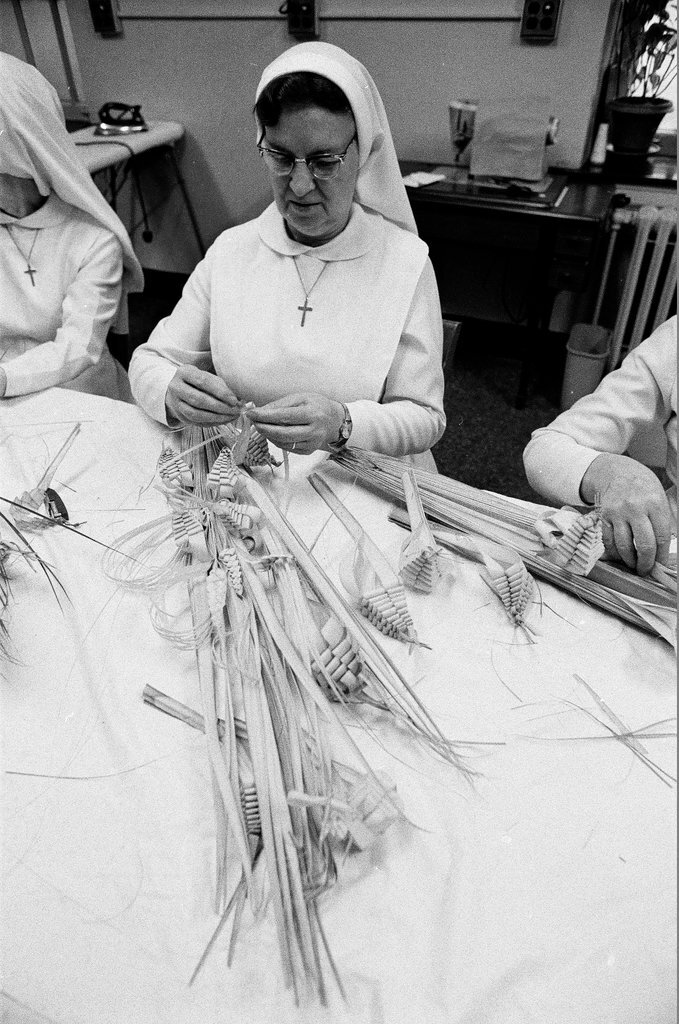 Nuns braiding palms - Chicago Sun-Times