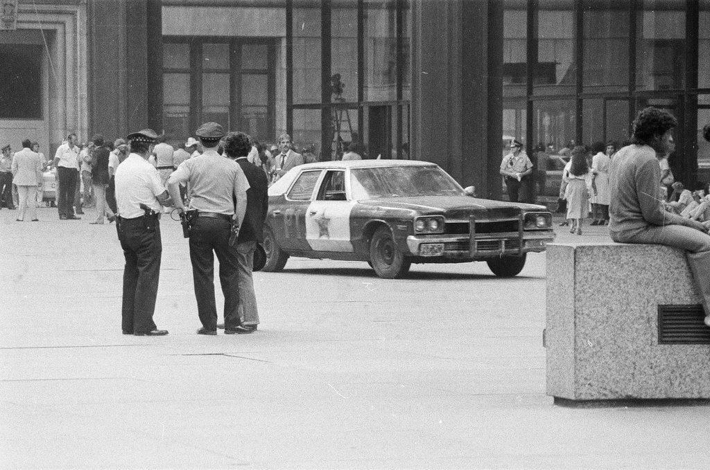 Stunt for Blues Brothers film and filming at Daley Plaza - Jack Lenahan,Chuck (Charles) Kirman for Chicago Sun-Times