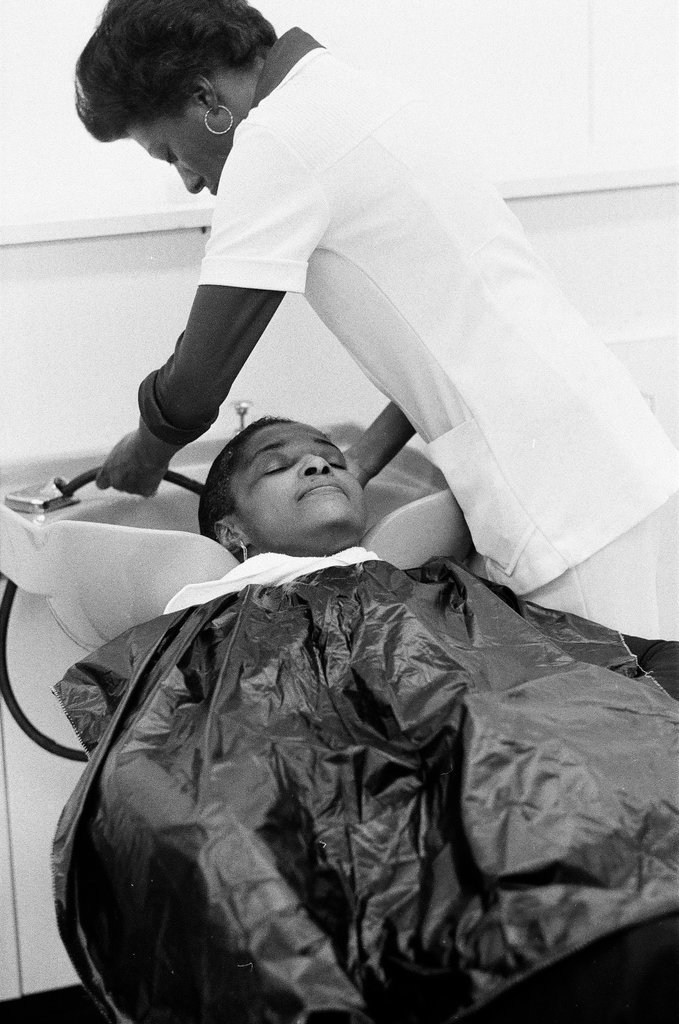 Beauty school students with customers - Chicago Sun-Times