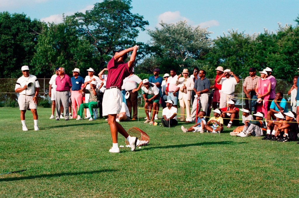 Tiger Woods hitting golf balls - Chicago Sun-Times
