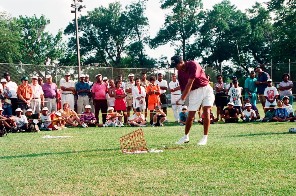 Tiger Woods hitting golf balls - Chicago Sun-Times