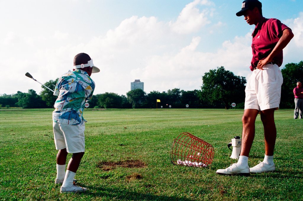 Tiger Woods hitting golf balls - Chicago Sun-Times