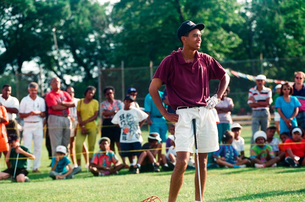 Tiger Woods hitting golf balls - Chicago Sun-Times
