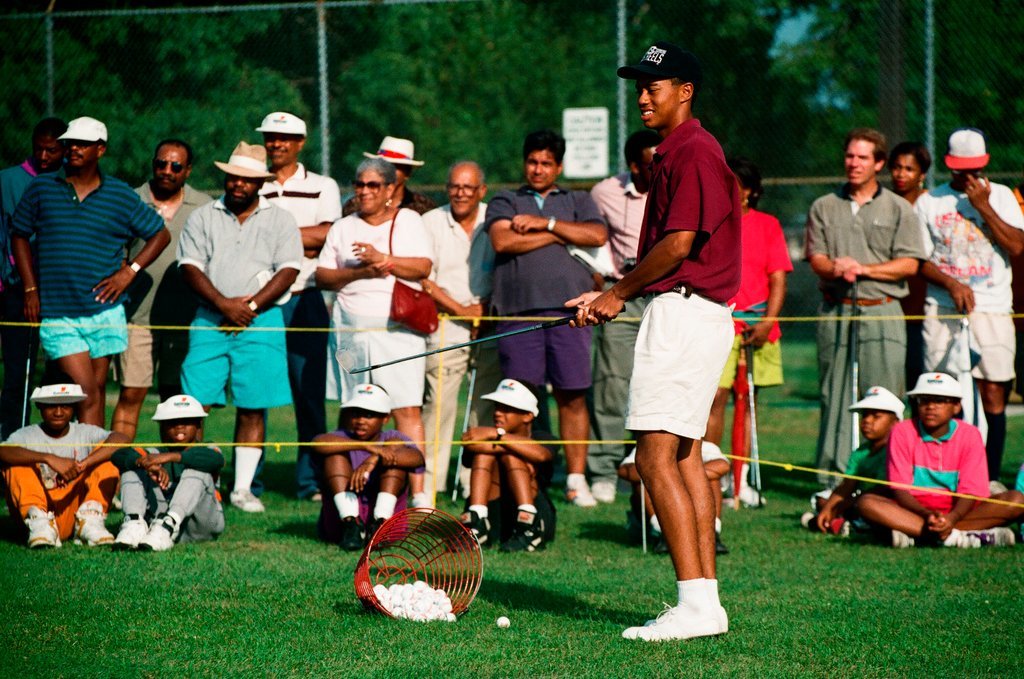 Tiger Woods hitting golf balls - Chicago Sun-Times
