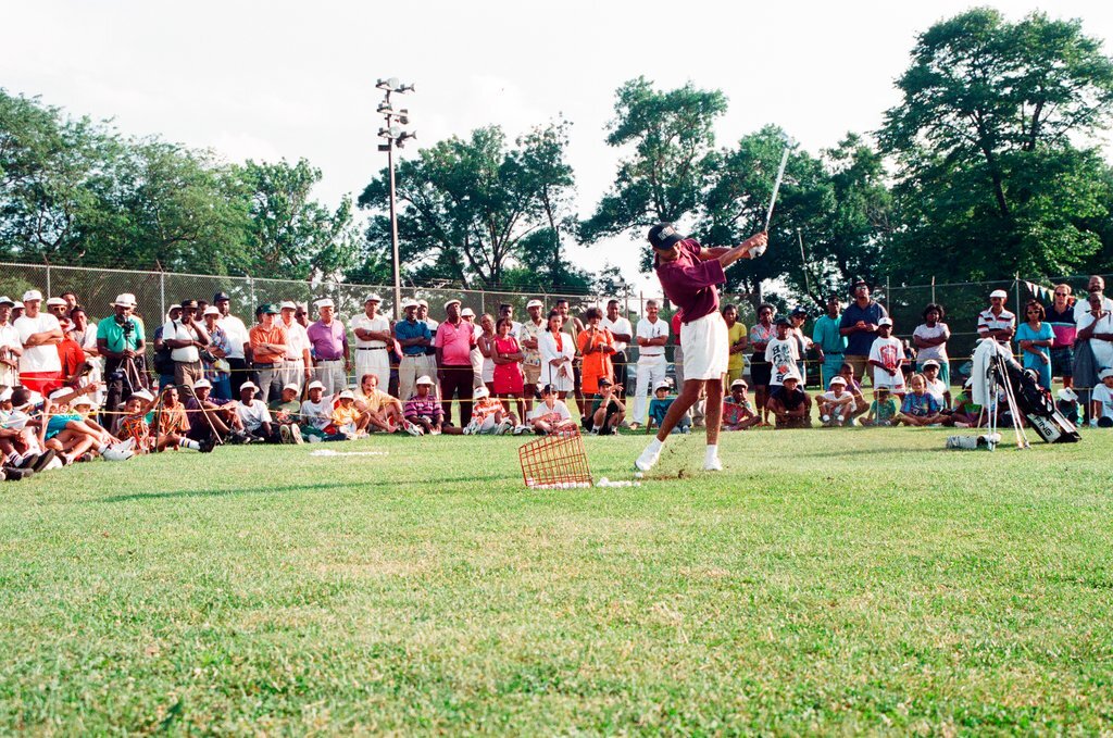 Tiger Woods hitting golf balls - Chicago Sun-Times